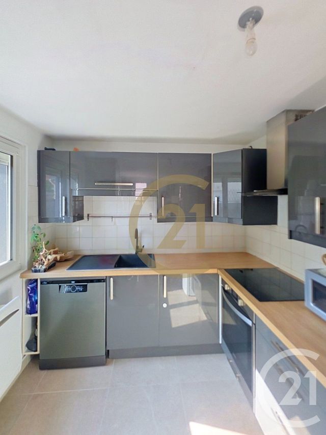 Maison &agrave; louer - 3 pi&egrave;ces - 57,05 m2 - Deville Les Rouen - 76 - HAUTE-NORMANDIE